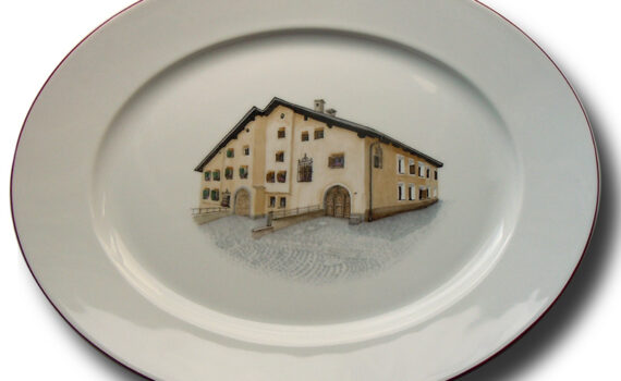 Haus auf ovaler Platte